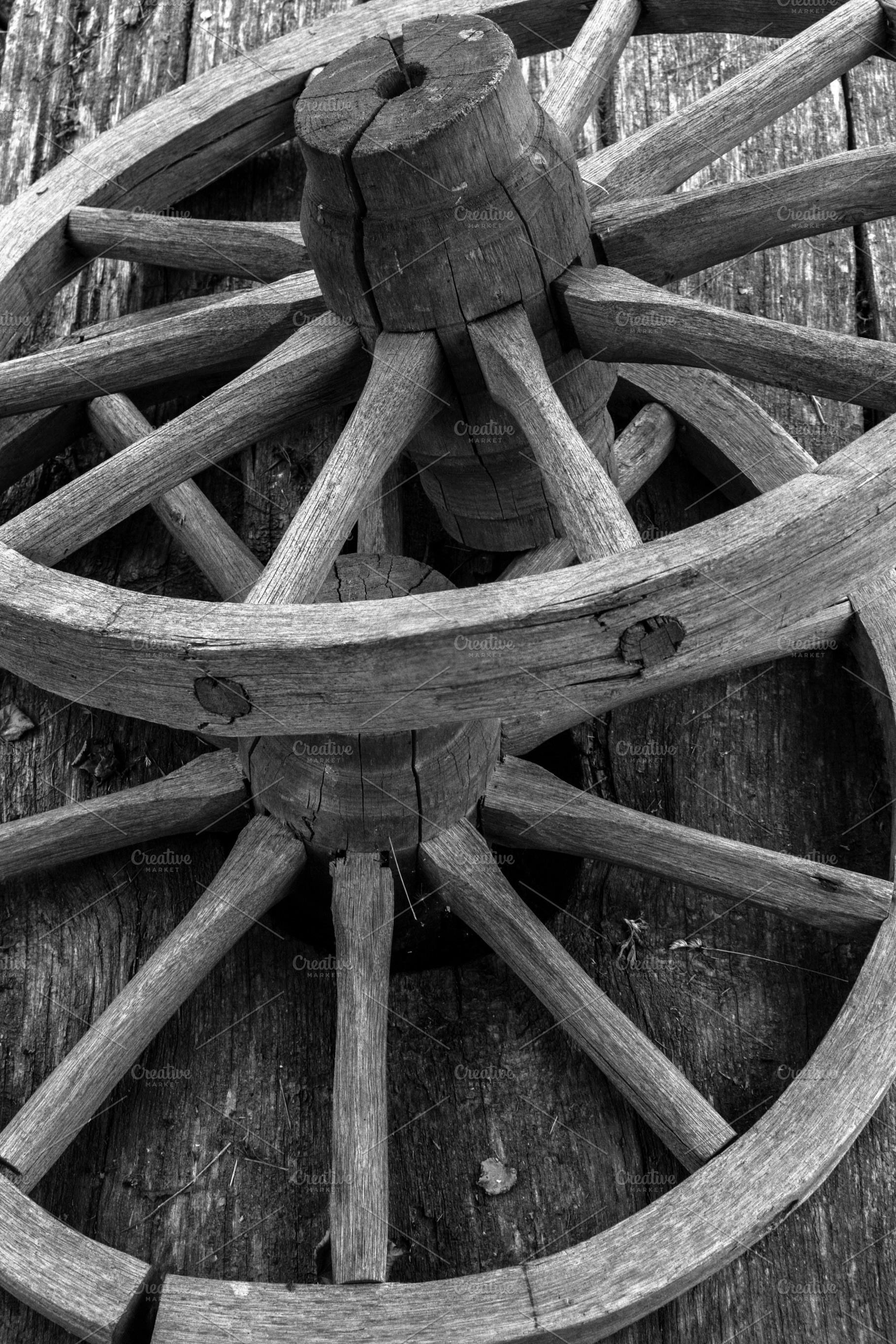 Fragment of a wooden wheel, a Technology Photo by Schreibikus