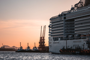 Cruise Ship In Port At Sunset, a Transportation Photo by SkyNext