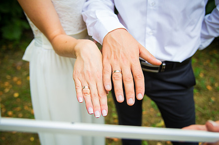 Newly wed couple's hands with wedding rings, a Person Photo by Artsaba Family