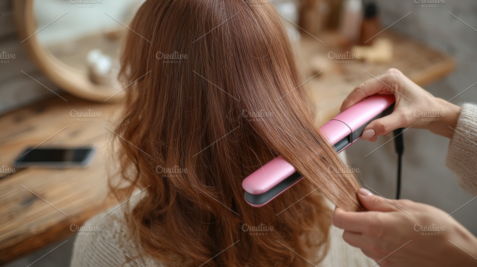 Woman getting her brown hair straigh, a Photo by Pixeness Studio