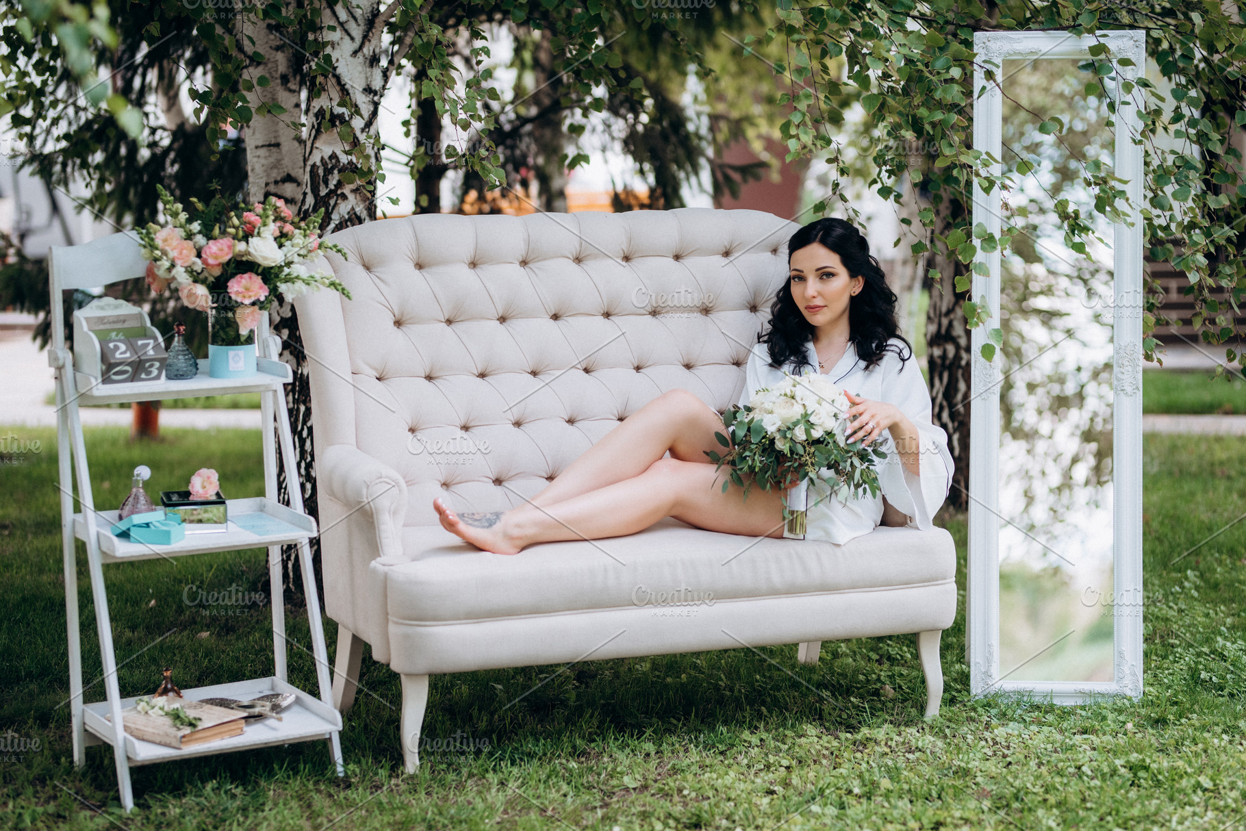 black-haired bride prepares for her wedding in a boudoir, a Person Photo by Weddings, People, Travel