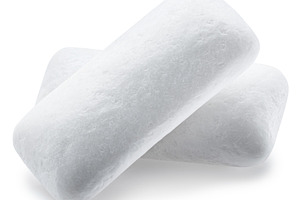 Chewing gum pieces on white backgrou, a Photo by Volff