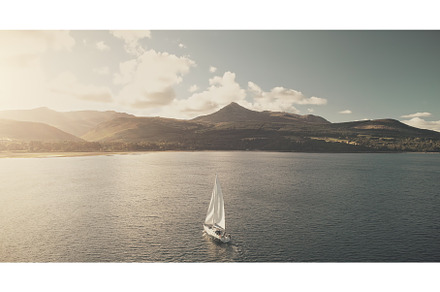 Sun reflection at ocean bay with, a Transportation Photo by Goinyk