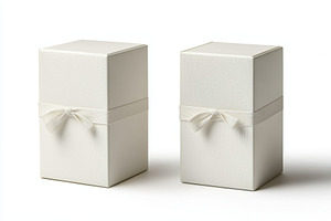 Elegant white gift boxes with ribbon, a Background Photo by Pixeness Studio