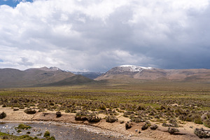 Vast valley and mountains landscape with dramatic sky, Peru, a Nature Photo by GoodGoods