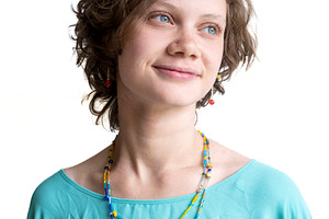 A medium close-up of a young woman w, a Person Photo by Imaginarium