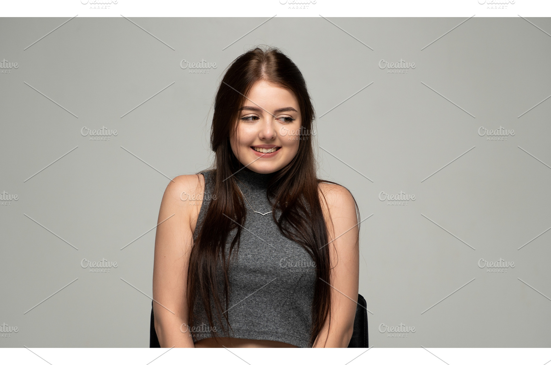 Young smiling brunette woman looking, a Person Photo by volodymyrshtun13795