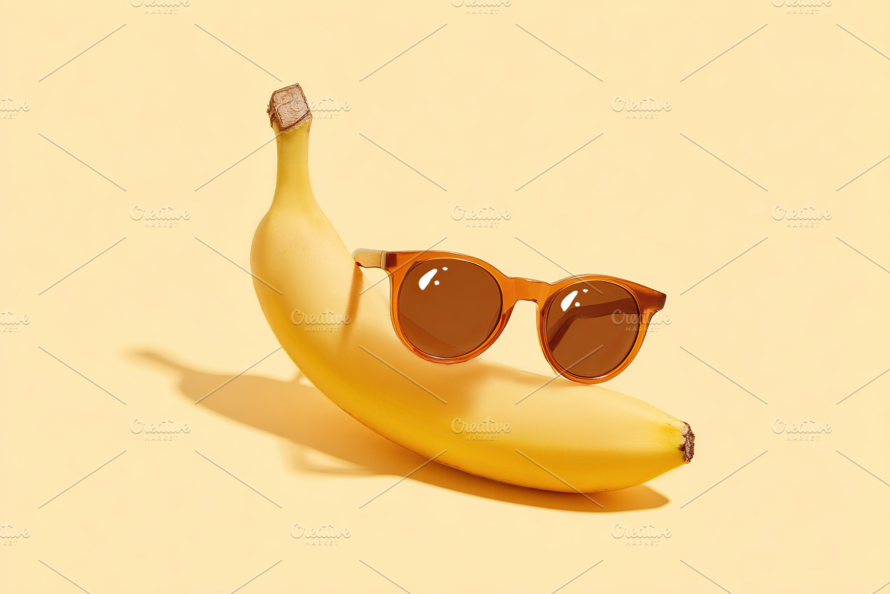 Banana wearing sunglasses poses cheerfully against a bright yellow background, a Food & Drink Photo by AlyaAnd
