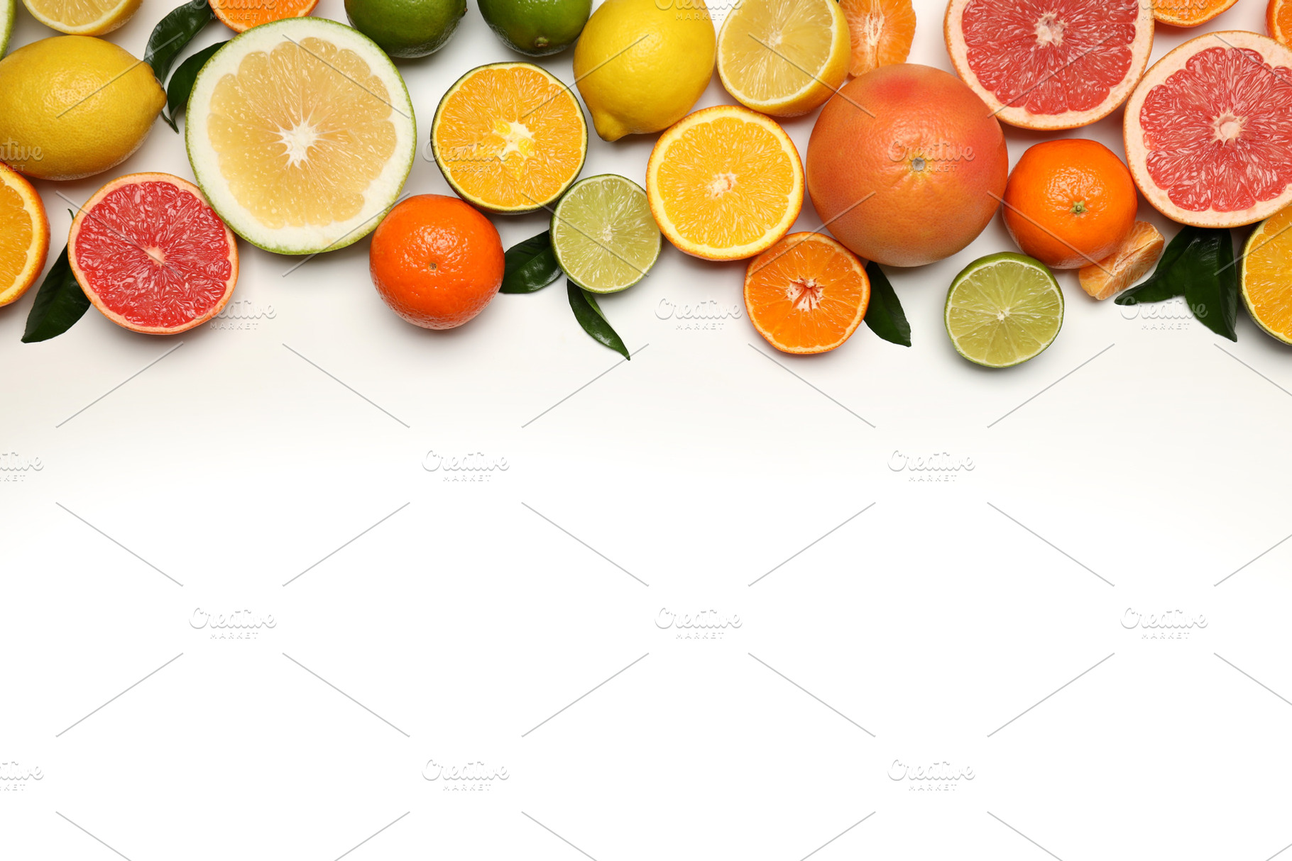 Citrus fruits with leaves on white background, a Food & Drink Photo by AtlasStudio PRO