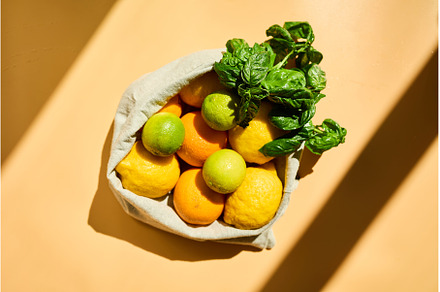 Fresh citrus fruits and basil