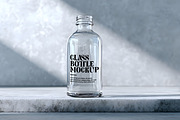 Glass Bottle Mockup, a Product Mockup by GenesisCreativeCo (Thumbnail 1 of 4)