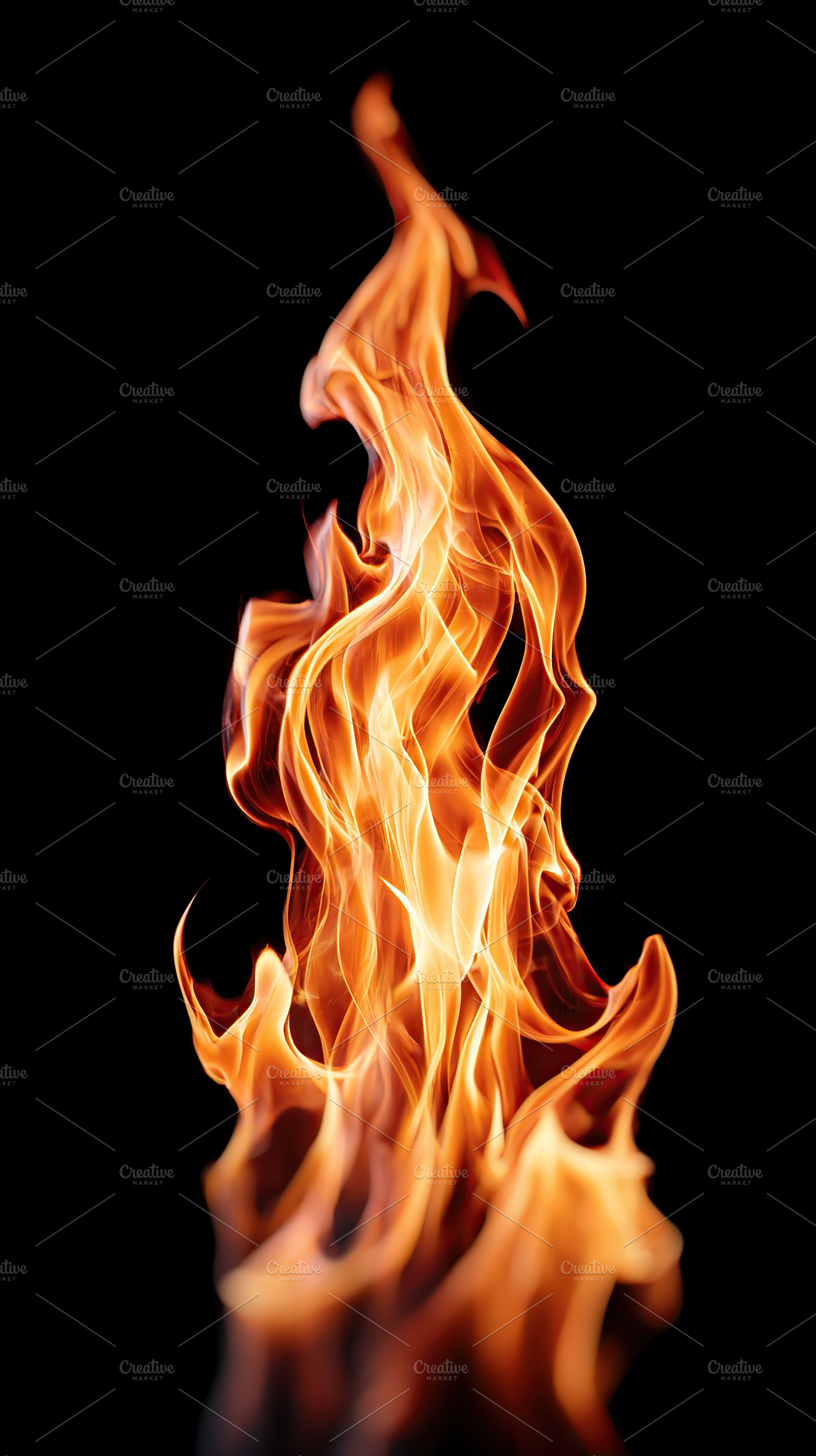 Dynamic flame dancing against a black background in dramatic display of fire's, an Arts & Entertainment Photo by AlyaAnd