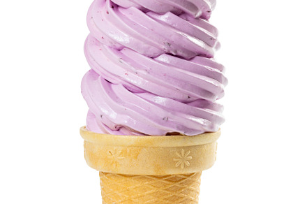 Soft fruit ice cream featuring cream, ice, and cone