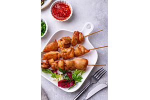 Chicken skewers kebab with, a Food & Drink Photo by Yulia Furman