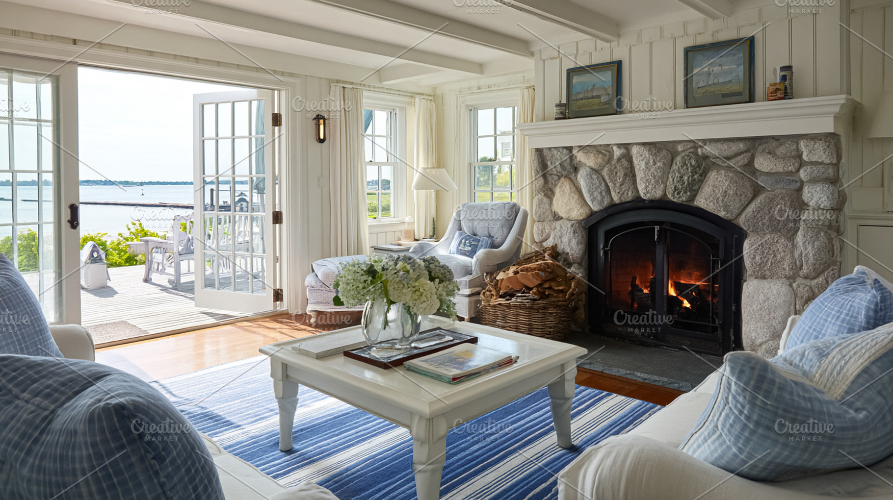 Cozy coastal living room featuring stone fireplace and ocean vie, a Photo by Studio ANNA