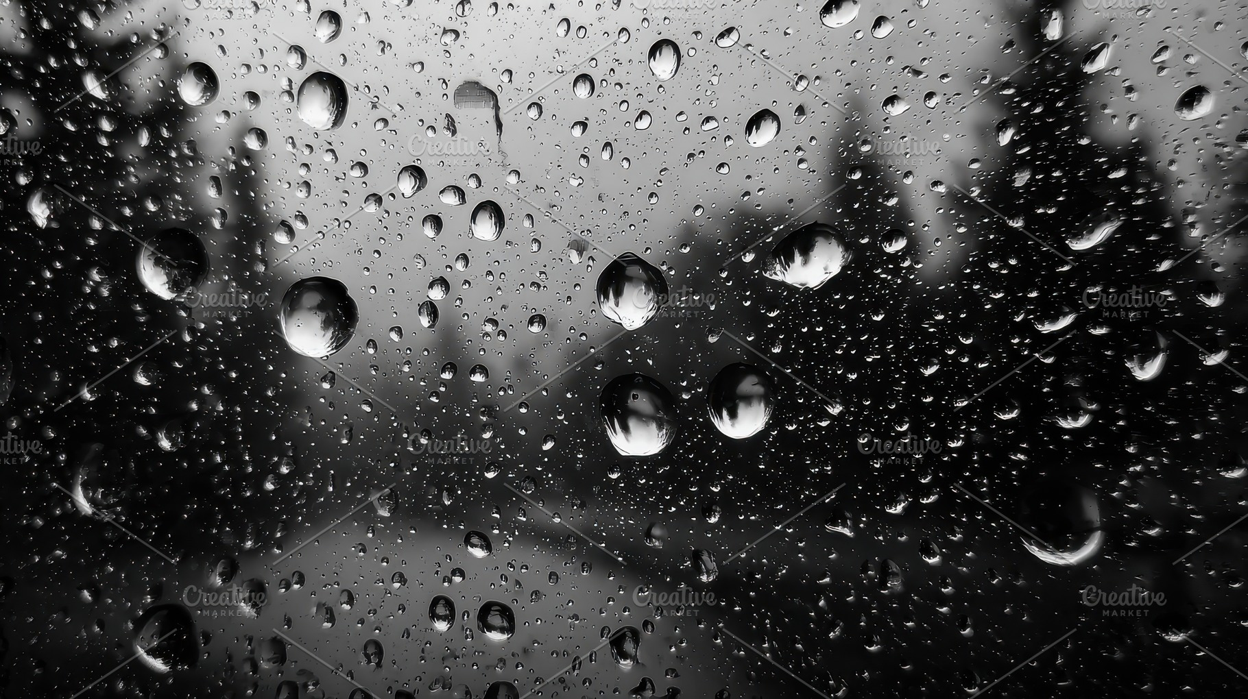 Rain drops on window blurry backgrou, an Abstract Photo by Pixeness Studio