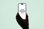 Hand Holding iPhone Mockup, an iPhone Mockup by mockeyai (Thumbnail 2 of 3)