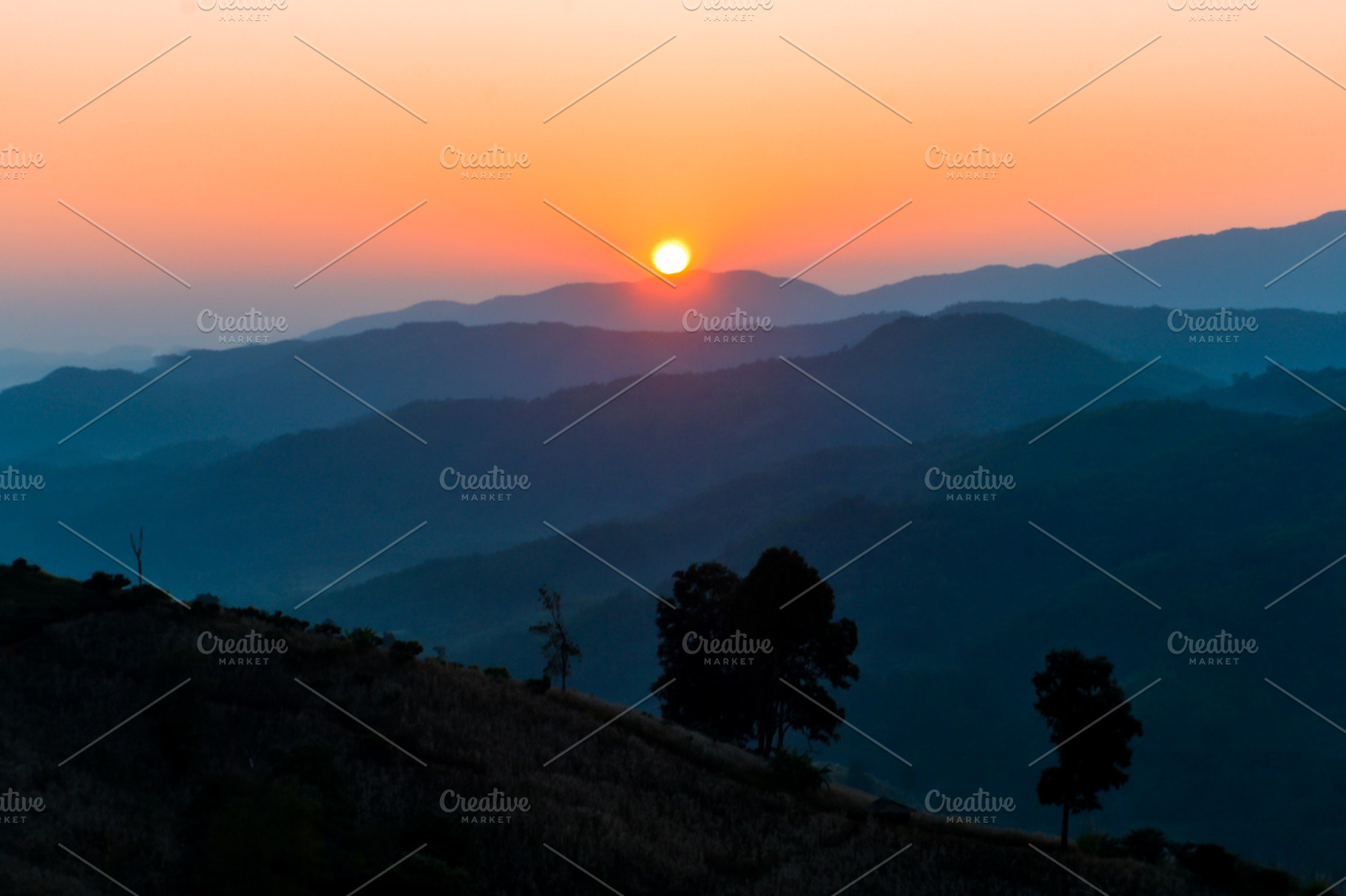 Sunrise on mountain containing autumn, background, and beautiful, a Nature Photo by Artmeesri