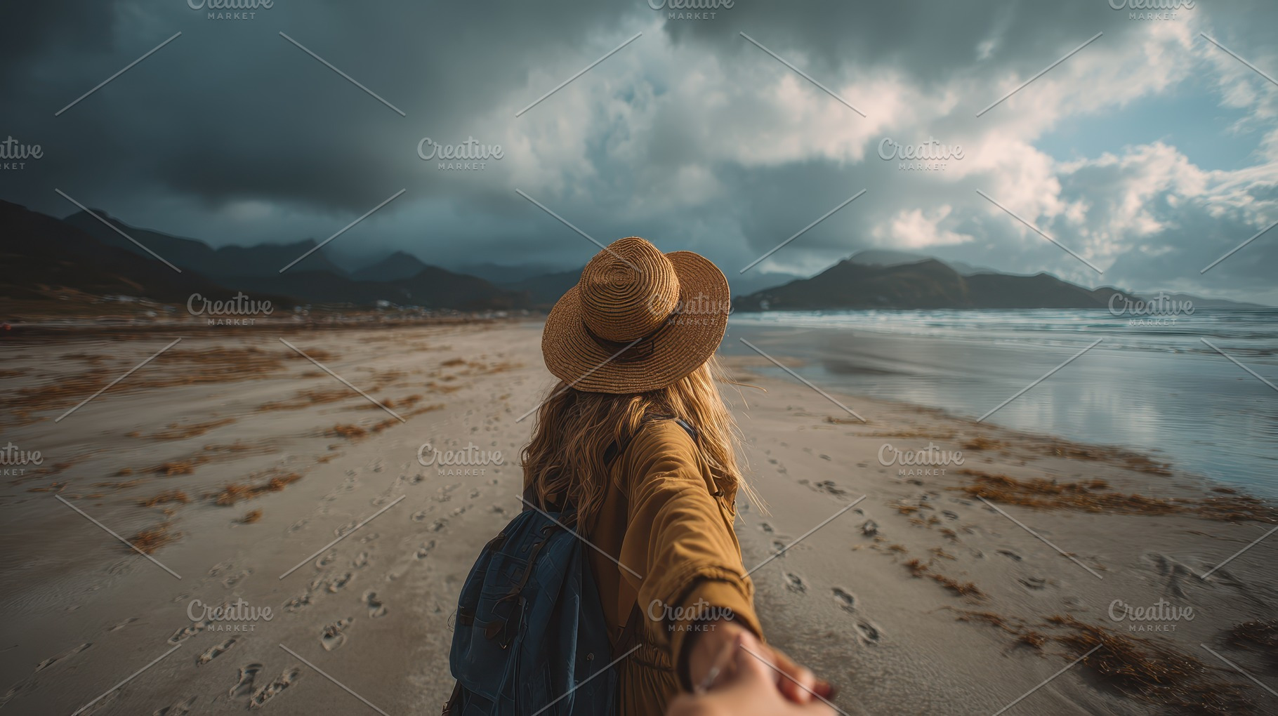 Woman walking on beach holding hand, a Photo by Pixeness Studio