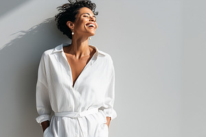 Confident woman in white outfit, a Person Photo by MistyDay
