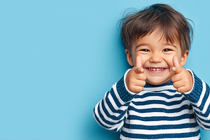 Cheerful little boy in striped, a Person Photo by MistyDay