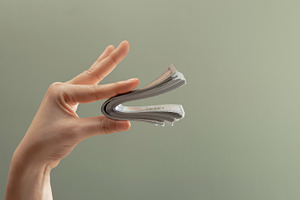 Hand holding bundle banknotes shaped like speaking mouth. Money, a Photo by salmon.black