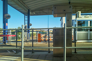 Empty toll booth station under metal canopy, a Transportation Photo by DanFLCreativo