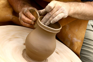 Potter making clay jug, a Person Photo by BOOCYS