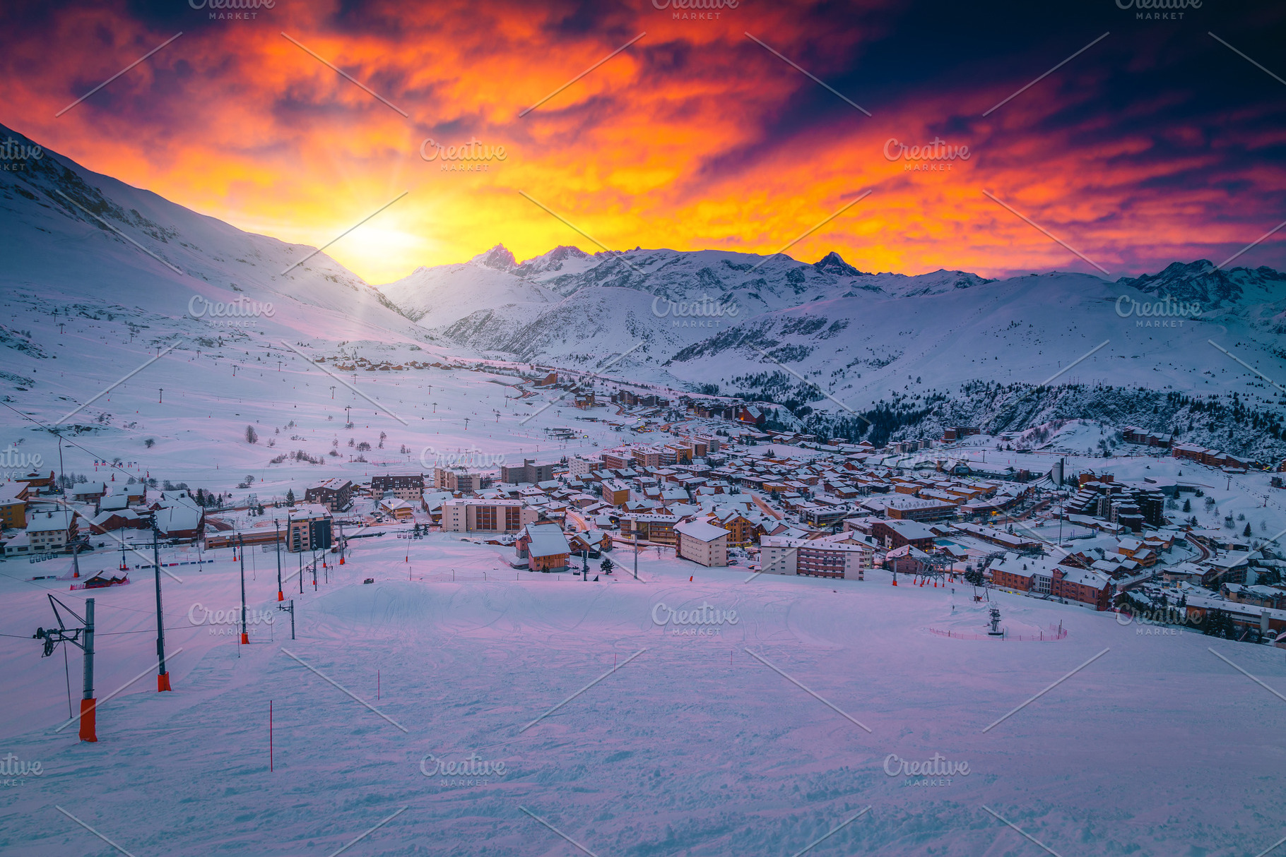 Colorful clouds over the ski resort, an Architecture Photo by Alpine Dreams