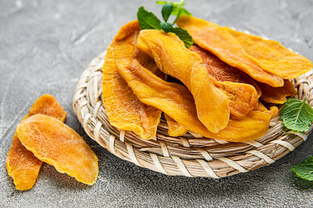 Dried mango slices, a Food & Drink Photo by Olena Rudo