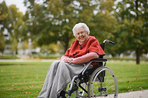 Portrait of elderly woman sitting in