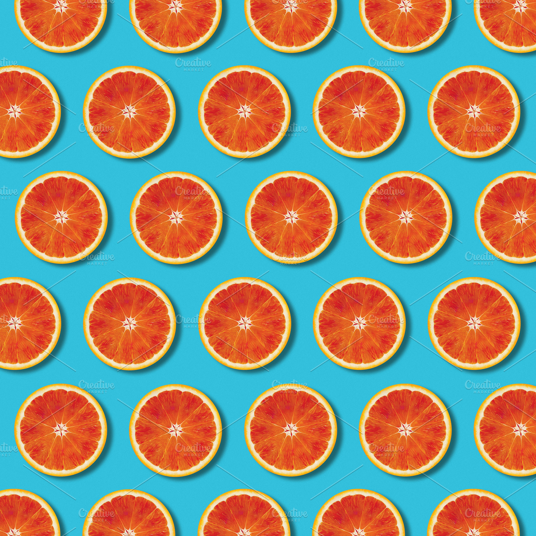 Top view red orange slices pattern, an Abstract Photo by BOOCYS