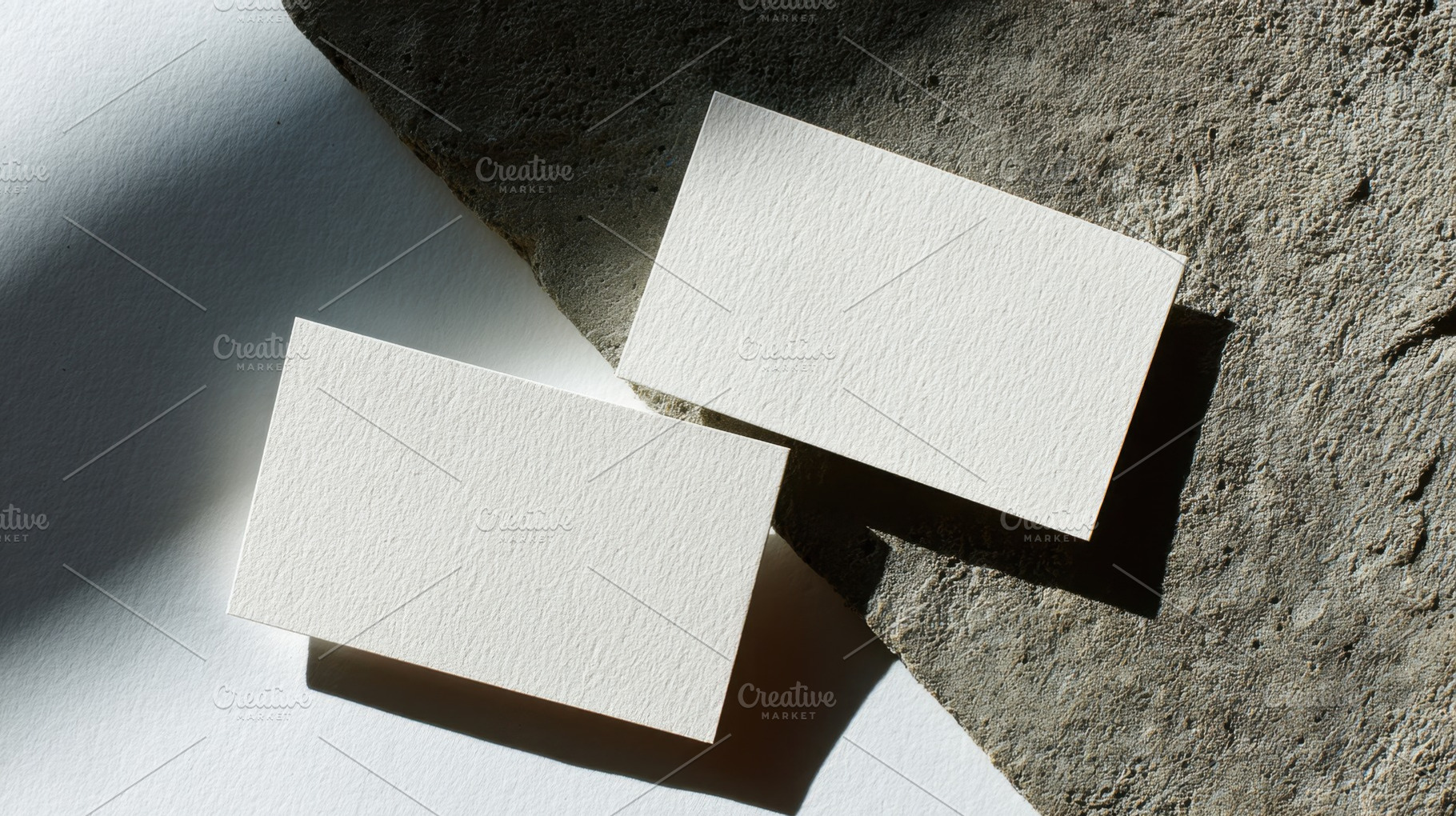 Simple blank business cards on stone, a Photo by Beautiful things