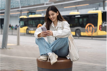 Checking public transport timetable, a Person Photo by AD Stock Images