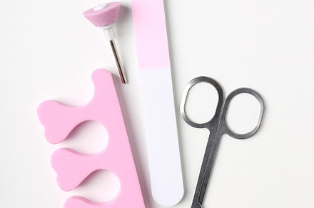 Concept of nail care with manicure accessories on white backgrou, a Beauty & Fashion Photo by AtlasStudio
