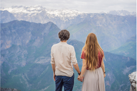 Man and woman happy couple tourists, a Nature Photo by Elizaveta Galitskaya