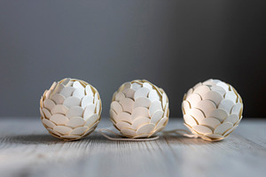 Three white handcrafted balls, a Wallpaper Photo by Imaginarium