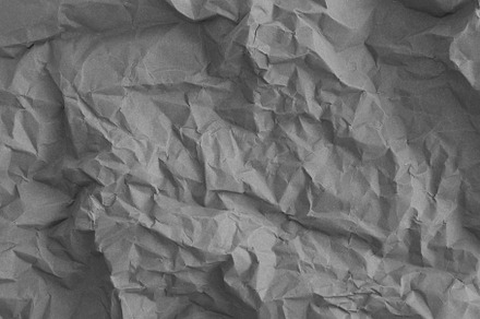 Grey crumpled wrinkled paper pattern surface texture background., a Background Photo by Tampatra