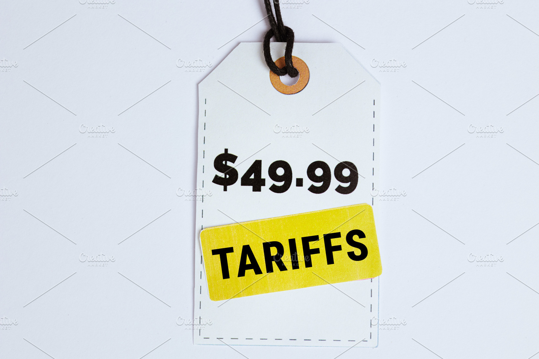 9.99 Price Tag with Tariff Sticker on White, a Business Photo by Alliance Images