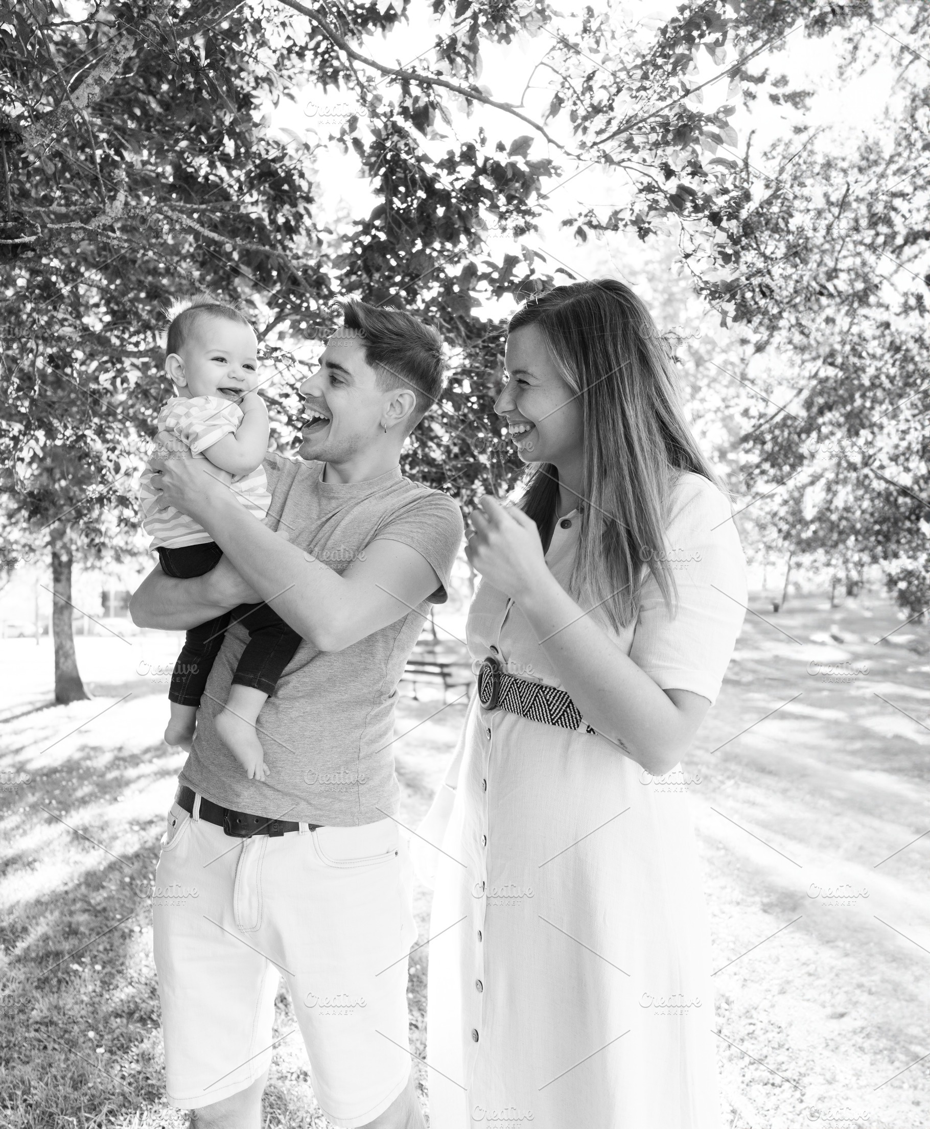 Portrait of a young family with their nine month old baby, a Person Photo by rubenchase
