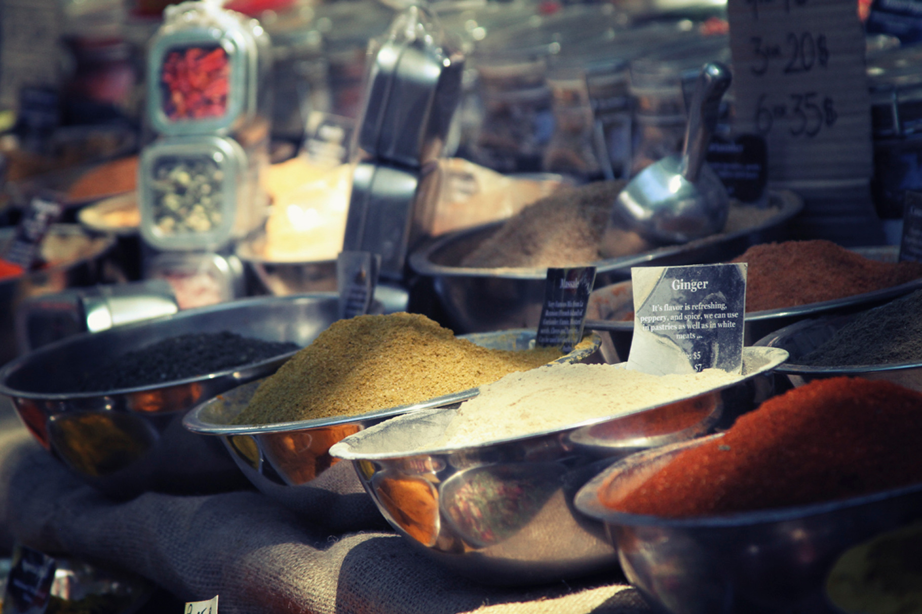 Street market containing tea, herbs, and market