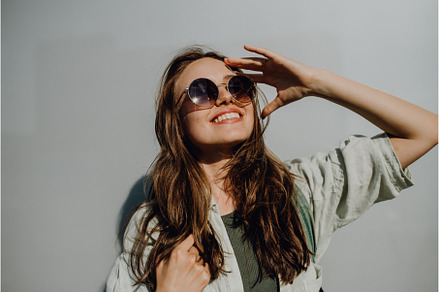 Portrait of happy young woman, a Person Photo by HalfPoint