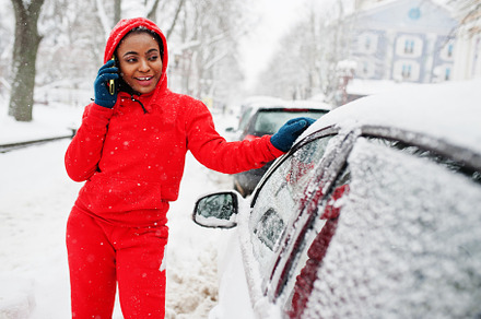 African american woman in red hoodie speak by phone near car in, a Person Photo by AS photostudio