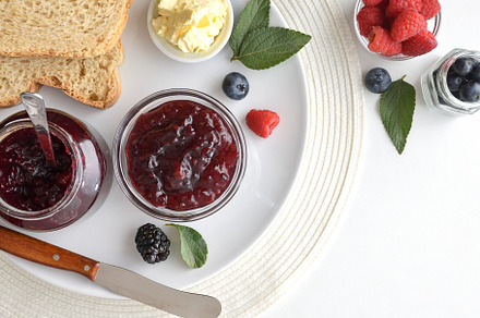Plate of breakfast food with berry jam butter and bread, a Food & Drink Photo by Davizro's Market