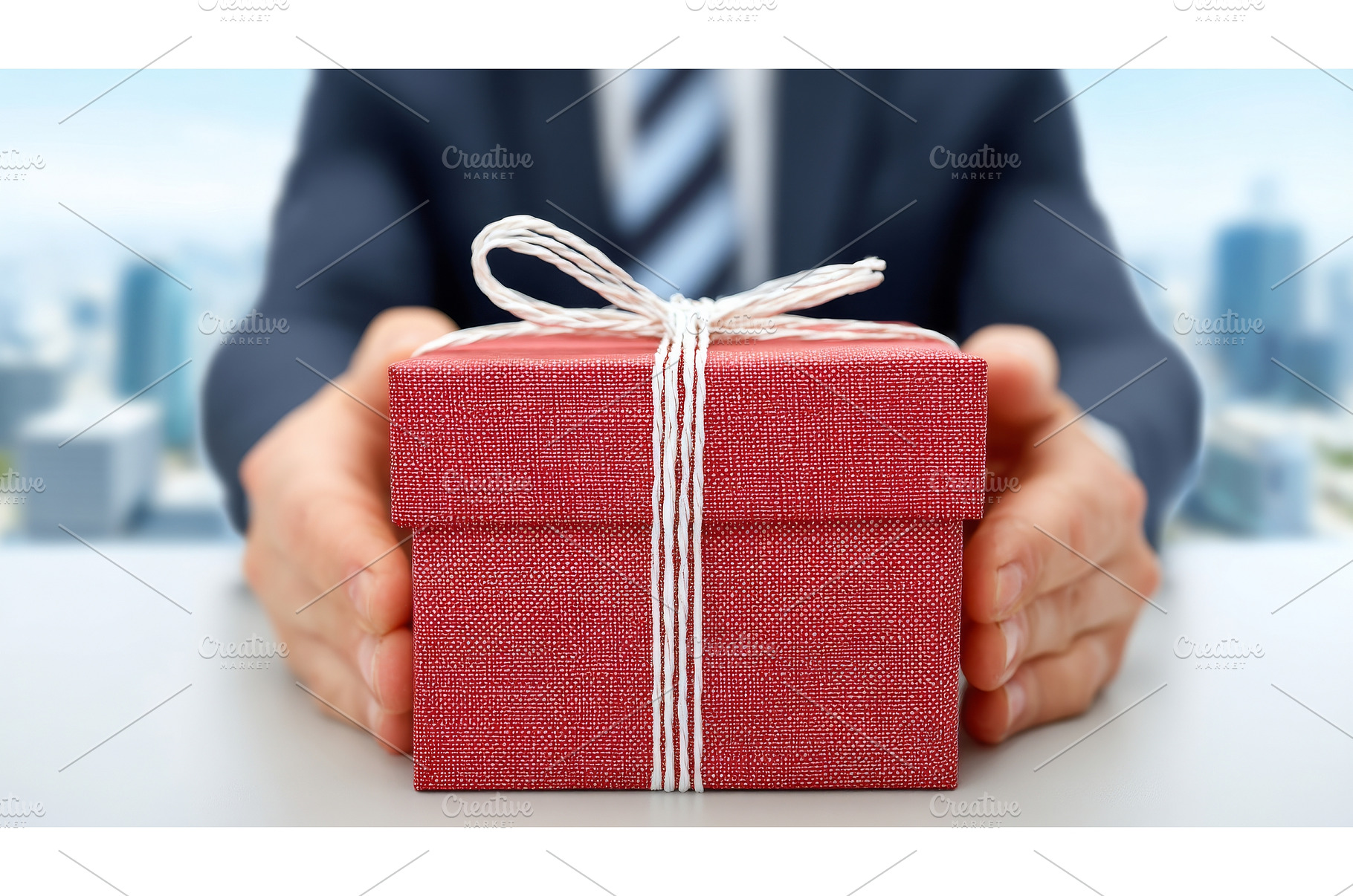A business man is shown holding a, a Holiday Photo by ZinetroN