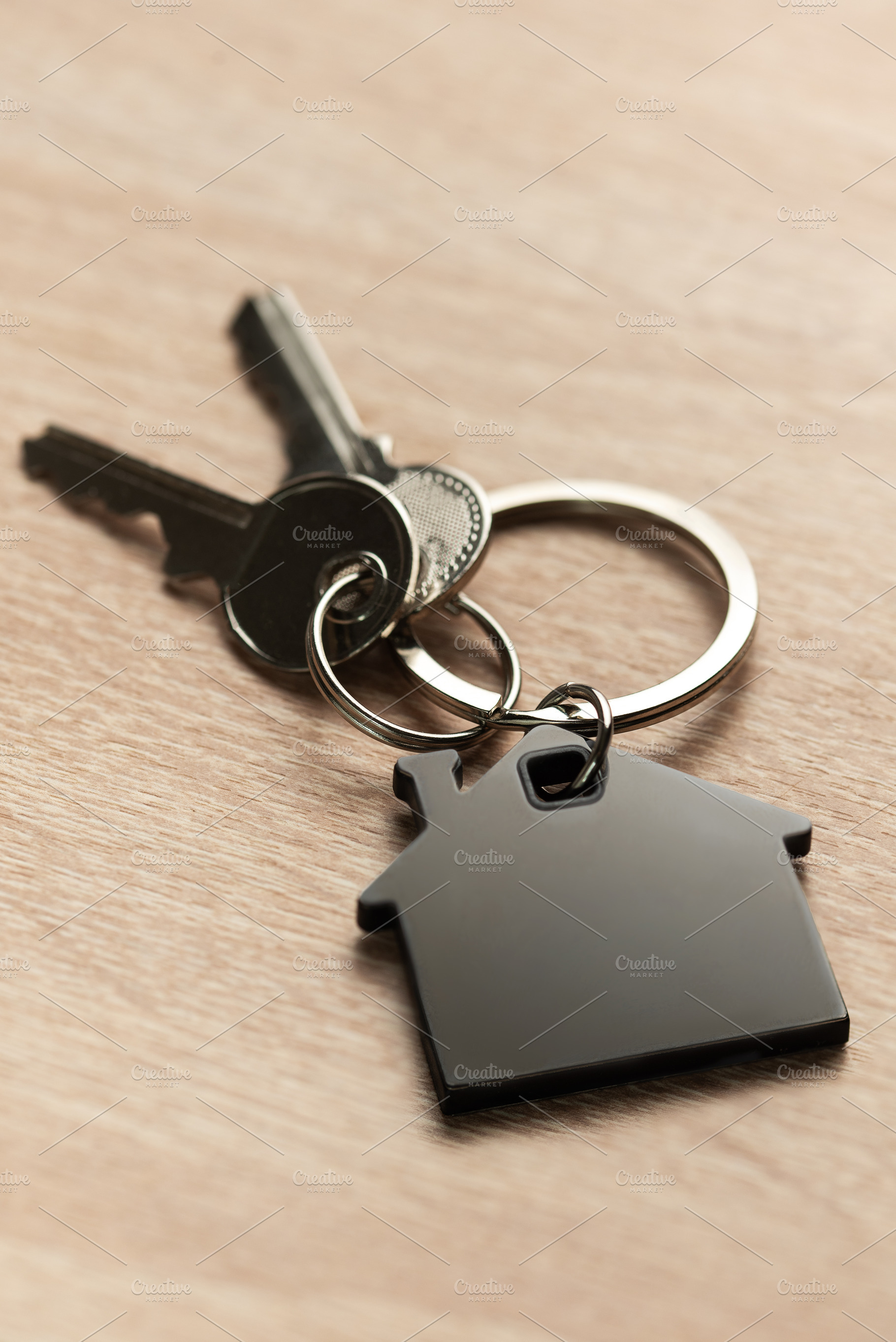 Keys with house shape keychain representing home ownership, a Business Photo by Olena Rudo