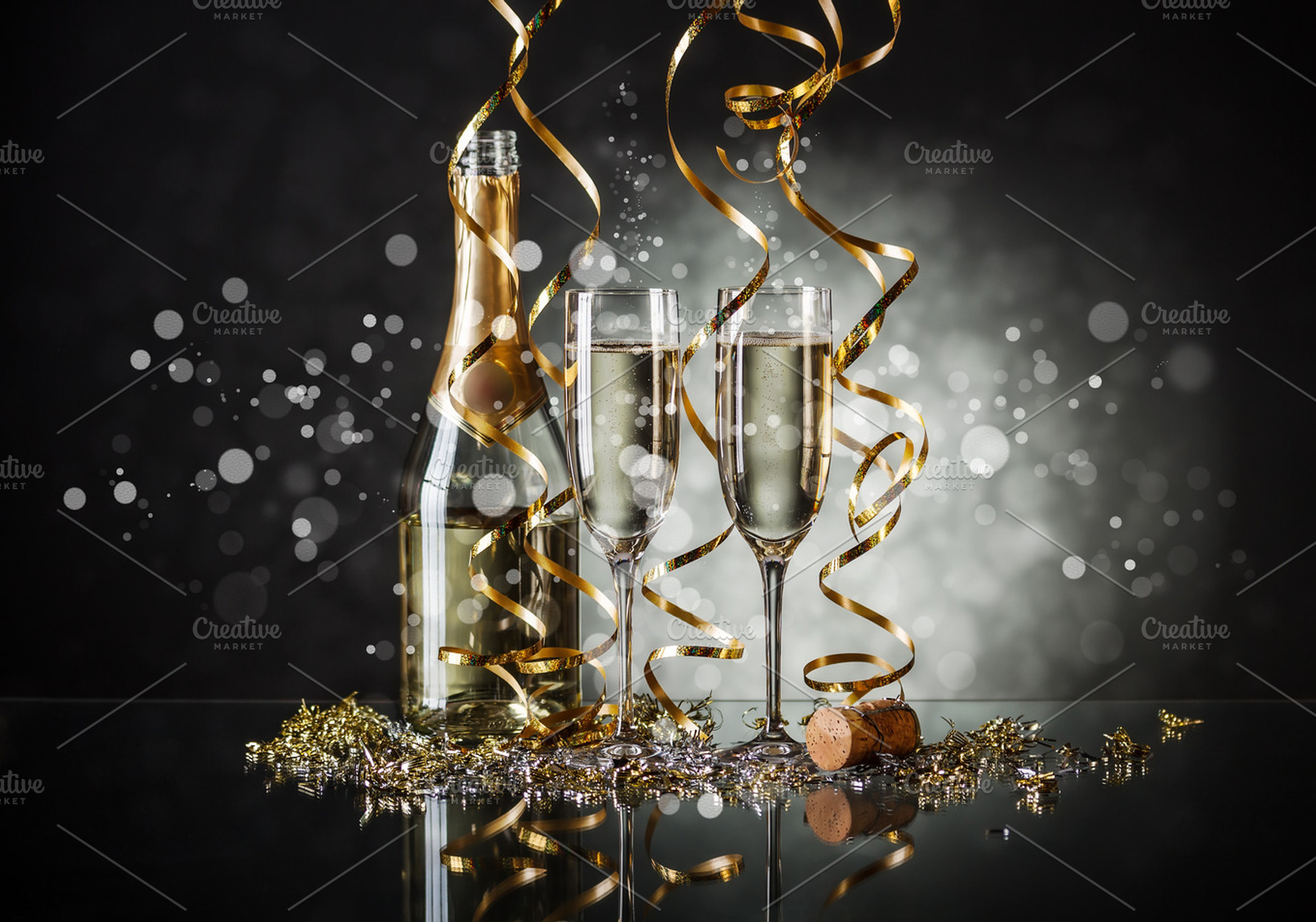 Glasses of champagne containing toast, glass, and wine