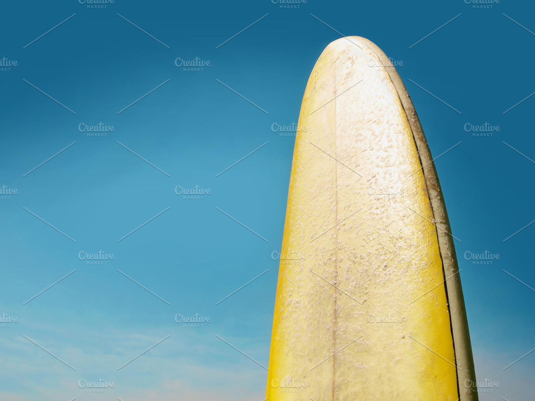 Surf Board And Blue Skies