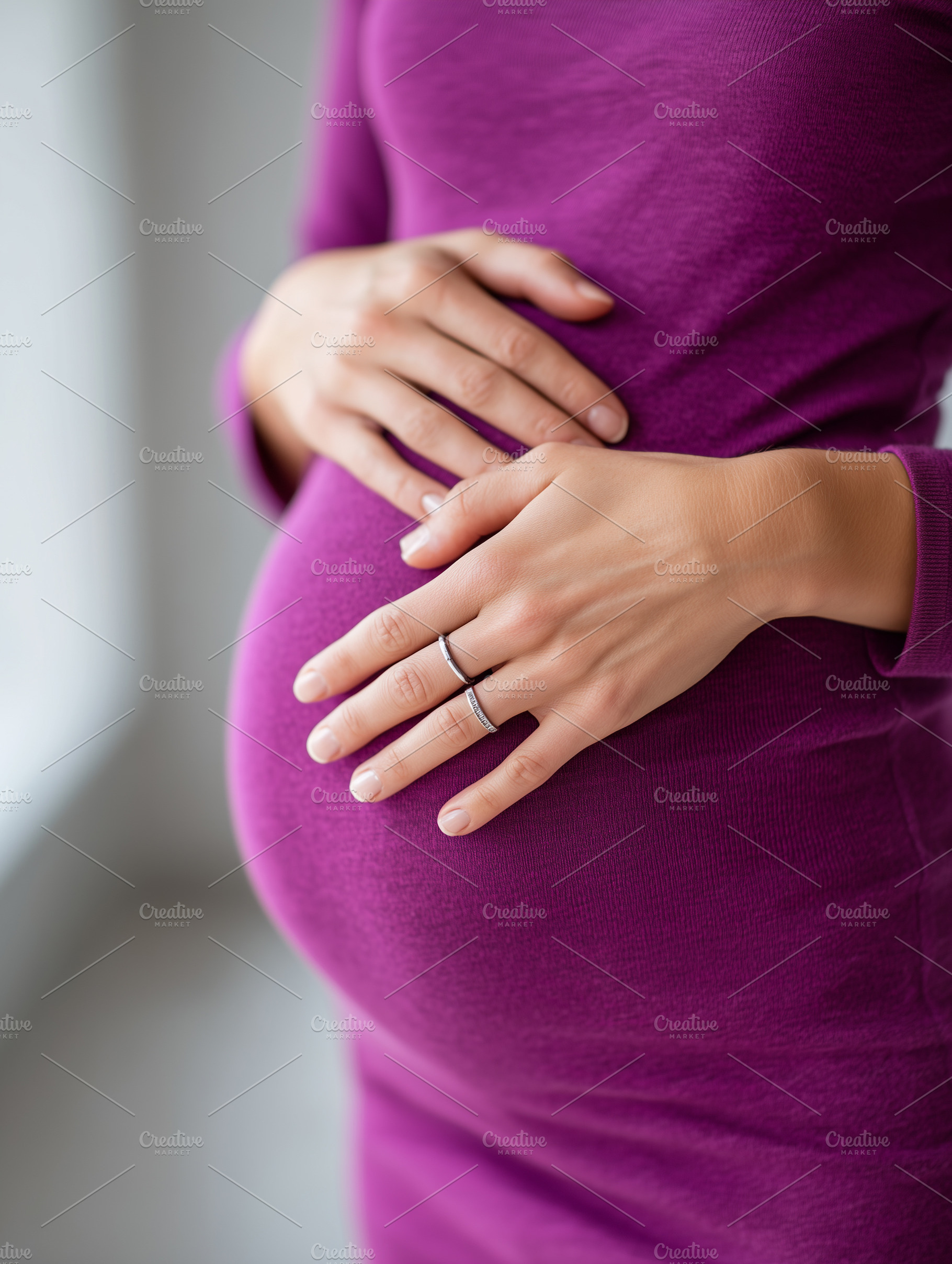 Pregnant woman in a purple dress, a Person Photo by MistyDay