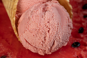 ice cream and red ripe watermelon, a waffle cup with watermelon-flavored ice cr, a Photo by rsoollAI